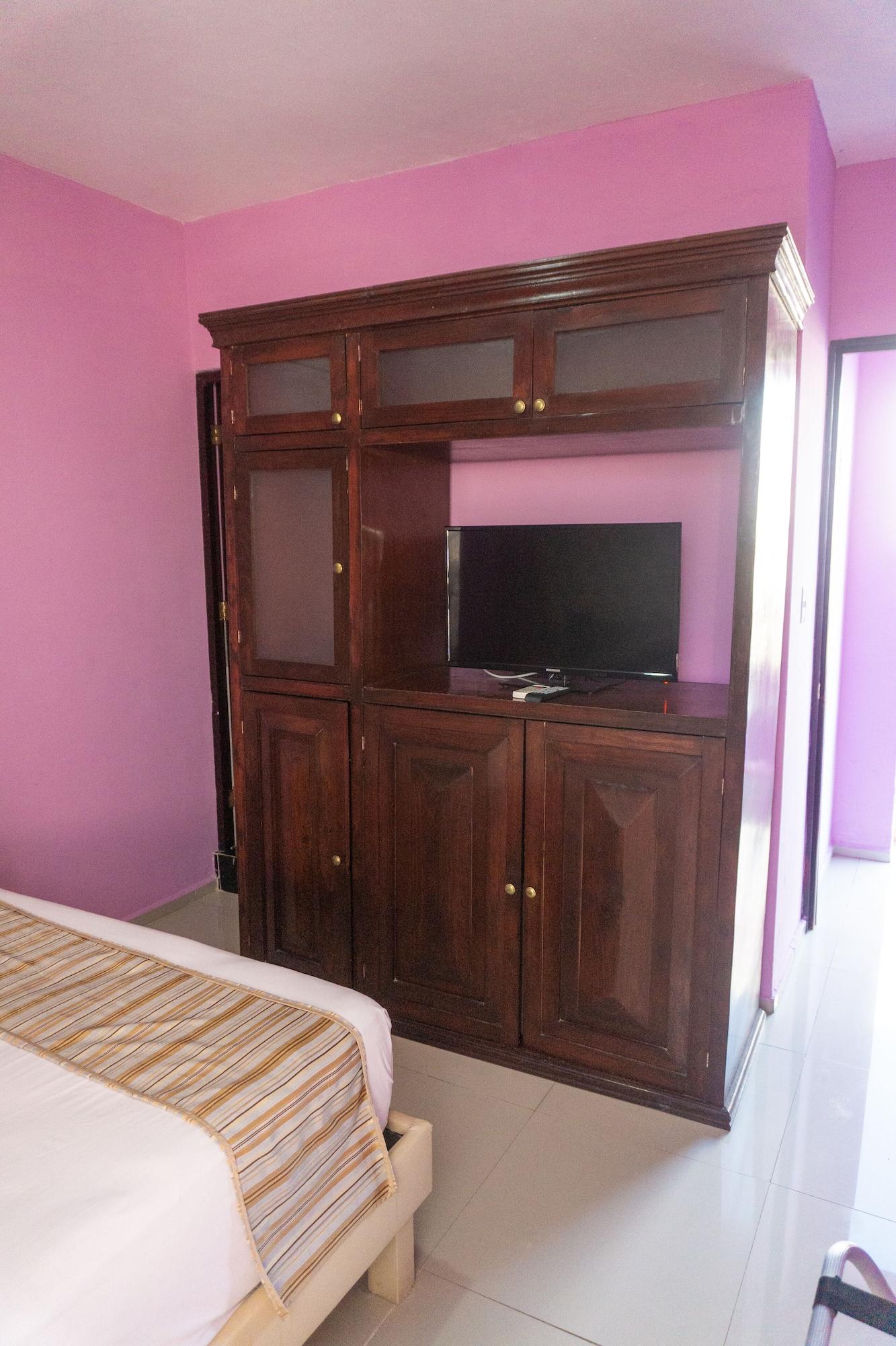 Hotel Lavanda Cas Merida Exterior photo A television set in a bedroom